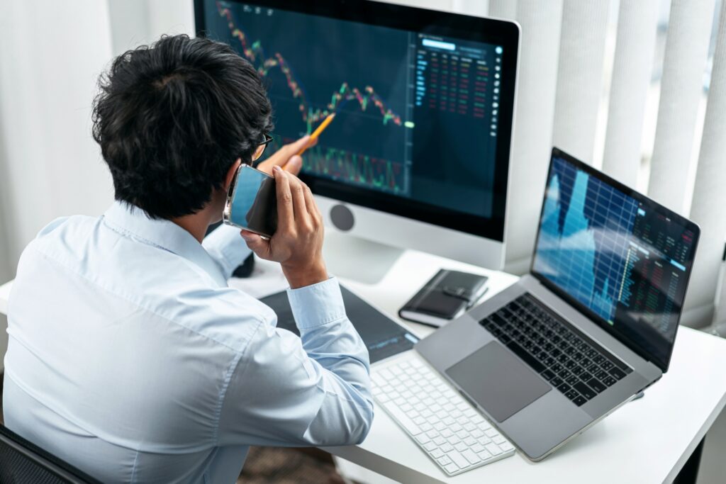 A man working on financial charts in the banking sector
