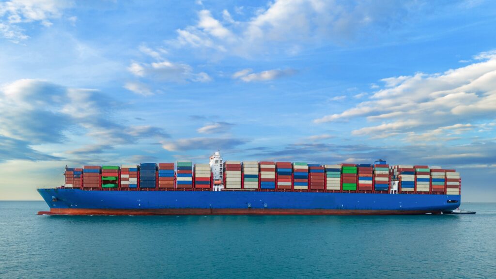 An image of a cargo ship representing global trade and commerce